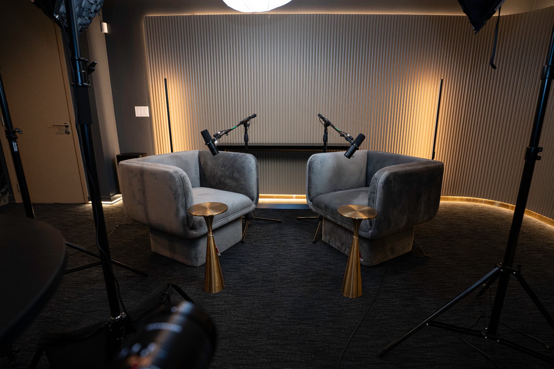 Riano Studio recording room with two chairs and microphones